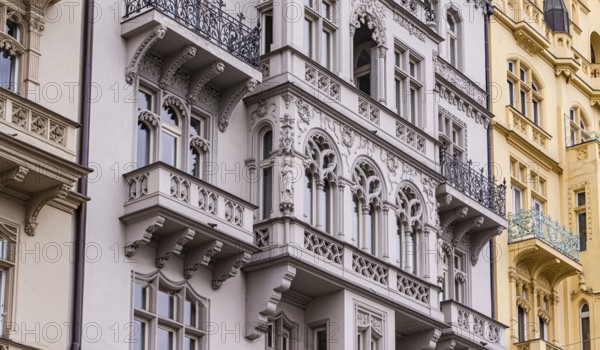 Detailed view of historic Prague facades, showcasing intricate designs and architectural elegance. Perfect representation of Old Prague's timeless charm and architectural splendor