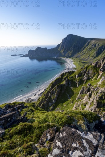 View of coastal landscape, cliffs with peak Måtind or Måtinden, Høyvika beach and sea, hike to the peak of Måtind, Andøya island, Vesterålen, Nordland, Norway
