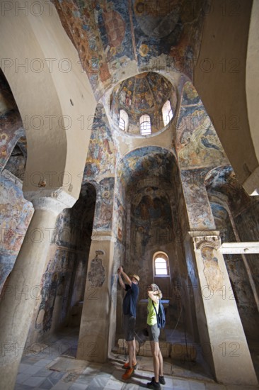 Church frescoes in the Byzantine ruined city of Mystras or Mistra on the Taygetos Mountains, UNESCO World Heritage Site, Laconia, Peloponnese, Greece