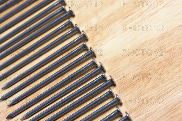 Macro of Nails on a Wood Background