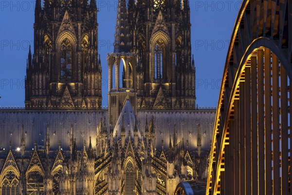 Cologne Cathedral and the Hohenzollern Bridge illuminated with LED lights, Cologne, North Rhine-Westphalia, Germany