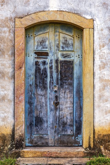 Carved wooden gate in an old baroque church in the city of Ouro Preto in Minas Gerais