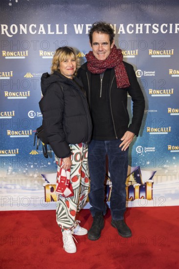 Marie Steinmann and Tom Tykwer at the premiere of the 20th Original Roncalli Weihnachtscircus in Berlin's Tempodrom on 20 December 2024