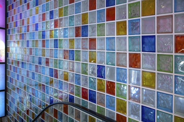 Wall with colored glass blocks in a stairwell, Nuremberg, Middle Franconia, Bavaria, Germany