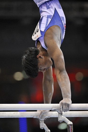 Uzair Chowdury GBR parallel bars action gymnastics, EnBW DTB-Pokal, Porsche-Arena, Stuttgart, Baden-Württemberg, Germany