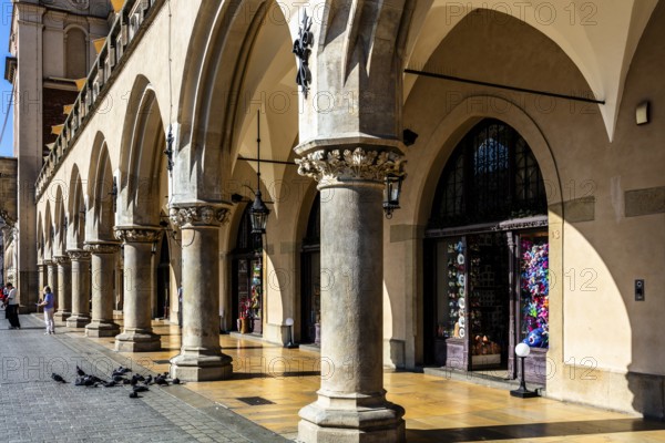 Arcades and Mascaron Heads, Rynek with Cloth Hall, from 13th century, Main Market Square, landmark of the city, Krakow, Poland