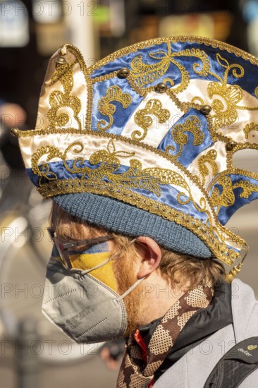 Peace demonstration against the war in Ukraine, instead of the Rose Monday parade in Cologne, with over 250, 000 participants, in the city centre, with many carnivalists, North Rhine-Westphalia, Germany