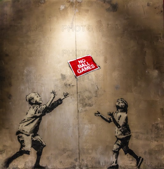 Banksy - No Ball Games, children obey and break the rules at the same time, 2009, Tottenham, London, UK, exhibition The World of Banksy