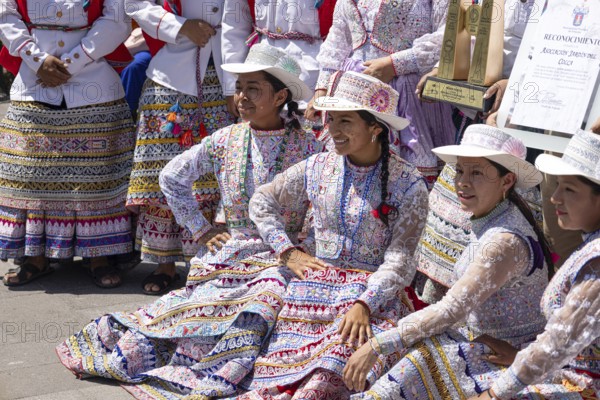 Arequipa, Peru, 2 February, 2026: Native indigenous people of Peru in National costumes perform dances and take images with people in Plaza de Armas in Arequipa, Peru