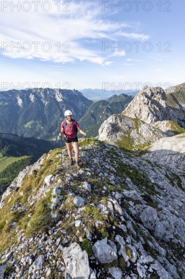 Hiker on a ridge in the mountains, Schaffauer, Wilder Kaiser, Tyrol, Austria