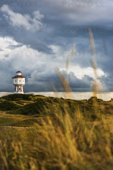 Water tower, clouds, weather, gloomy, cloudy, cloudy sky, storm, stormy, dune landscape, North Sea island, Langeoog, Germany