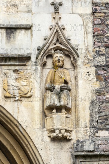 Detail of historic church of Saint John in the Wall, statue of Bellinus, Broad Street, Bristol, England, UK