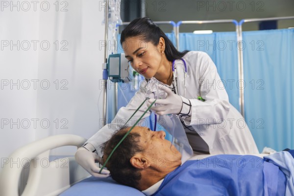 A compassionate doctor attentively assists a patient in a hospital room, ensuring proper care with medical equipment and oxygen support, highlighting dedication in healthcare settings