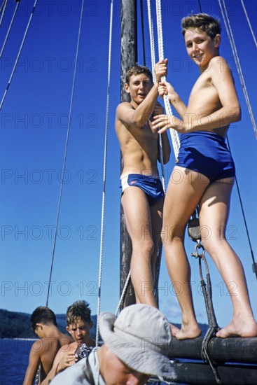 Melbourne Grammar School expedition to Queensland, Australia, 1956 Boys on a sailing yacht thought to be the Whitsunday Islands
