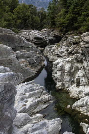 Rocks, granite rock formations in the Maggia River near Ponte Brolla, in the Maggia Valley, Valle Maggia, Canton Ticino, Switzerland