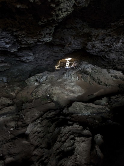 La Cova Foradada cave at the Far de Cap de Barbaria lighthouse on the southern tip of Formentera, Balearic Islands, Spain