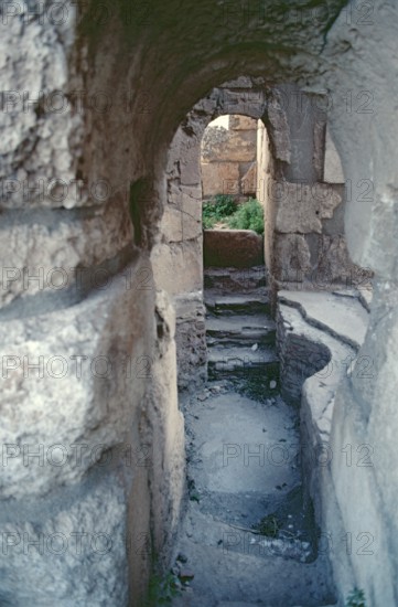 Baptismal font for mass baptisms of adults, baptistery, baptismal church, monastery of St Simeon Stylites, Qal?at Sim?an, near Aleppo, Syria, May 1987, vintage, retro, old, historical