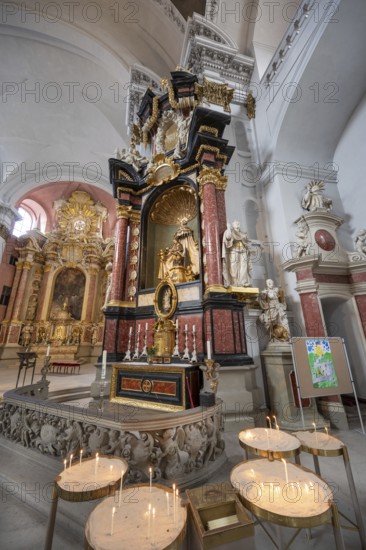 Sacrificial candles on the side altar in the baroque church of St Martin, Grüner Markt, Bamberg, Upper Franconia, Bavaria, Germany