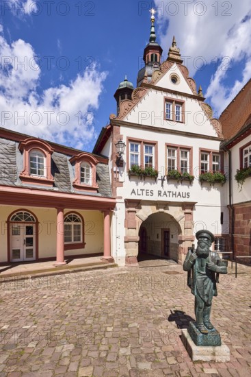 Old town hall, church tower, Erbach town church, historical buildings, sculptor Albrecht Glenz, Räibock, petit bourgeois monument, bronze sculpture, blue sky with cumulus clouds, market square, Erbach, Odenwald, Odenwaldkreis, Hesse, Germany