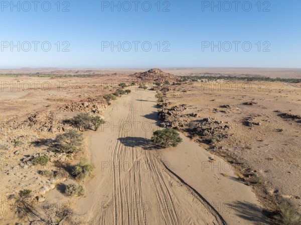 Aerial view, dry riverbed and desert landscape at Ugab River, Erongo, Damaraland, Namibia