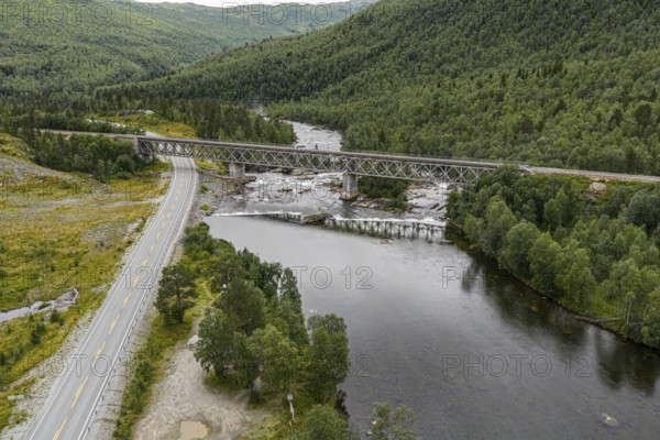 Raufjellfossen railway bridge, Nordland railway (Nordlandsbanen), waterfall at Ranelva river, near Mo i Rana, aerial view, Norway