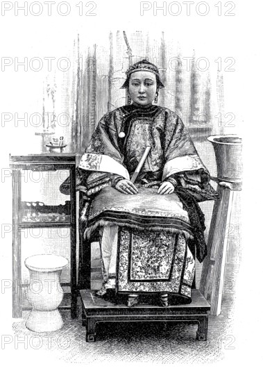 Woman in China from the higher classes, around 1896, illustration, reproduction from a model from the 19th century. Authentic, file restored for optimal use, exact date of original unknown, historical, person in traditional clothing sitting on a wooden chair in a richly furnished room