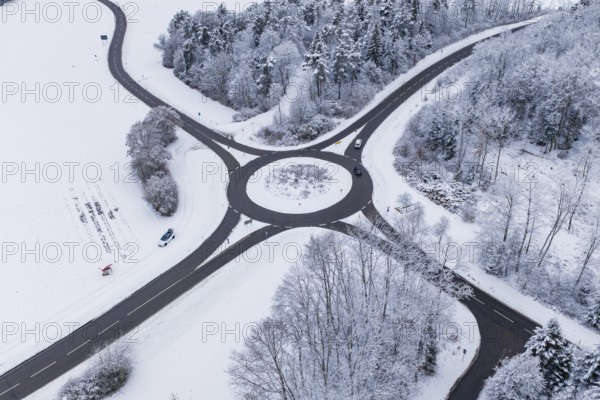Aerial view of a roundabout in winter surroundings, Gechingen, Calw district, Germany