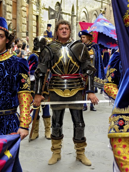 Il Palio di Siena, historical horse race, knight with sword, captain of the Nobile Contrada del Nicchio, shell, parade in costume through the alleyways, Passegiata storica, old town centre, Siena, Tuscany, Italy