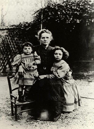Marie Curie with her daughters Irene and Eve shortly after the death of Pierre Curie