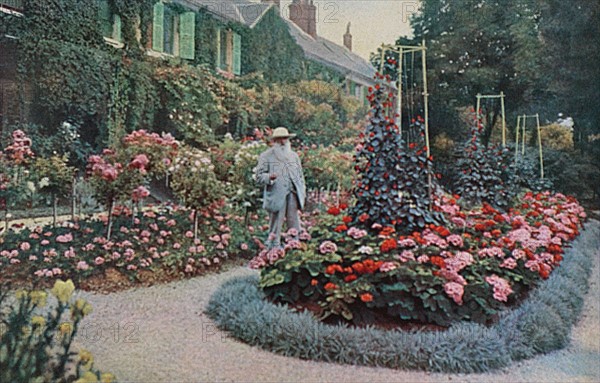 Claude Monet dans le jardin de sa maison de Giverny