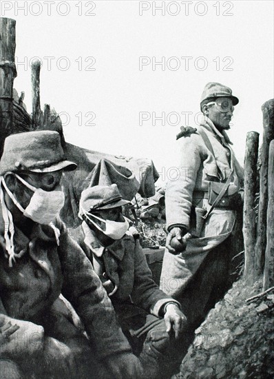 World War I. In a front-line trench in Vauguois, a soldier prepares to throw a grenade