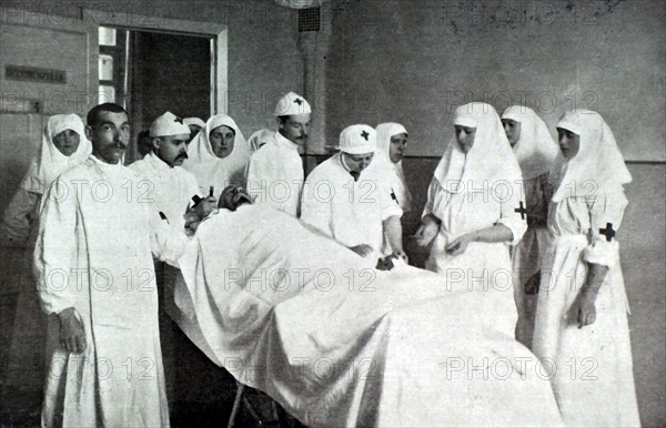World War I. The Empress of Russia and her two eldest daughters caring for the wounded, in Petrograd