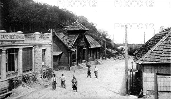 World War I. In Alsace, French soldiers removing German signs at the Schlucht Pass