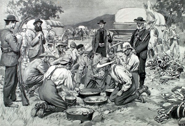 Guerre du Transvaal. Prisonniers anglais prenant leur repas au camp boer (1901)