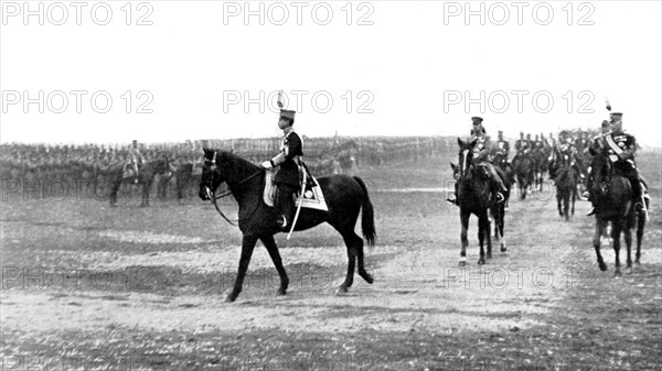 Japanese Emperor Hiro-Hito passing his troops in review (1929)