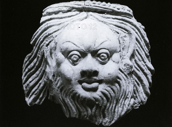 Demonic genius, moulded clay