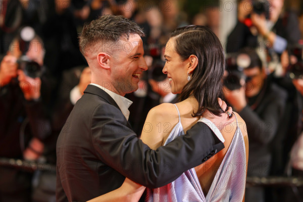 Tom Sturridge and Alexa Chung (in Christian Dior) depart the "The Man I Love" screening during the 79th annual Cannes Film Festival at Palais des Festivals on May 20, 2026 in Cannes, France.