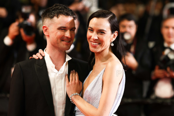 Tom Sturridge and Alexa Chung (in Christian Dior) depart the "The Man I Love" screening during the 79th annual Cannes Film Festival at Palais des Festivals on May 20, 2026 in Cannes, France.