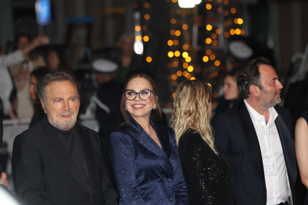 Franco Nero, Ornella Muti (in Solangel), Isabella Ferrari (in custom Saint Laurent), attend the "Roma Elastica" screening during the 79th annual Cannes Film Festival at Palais des Festivals on May 20, 2026 in Cannes, France.