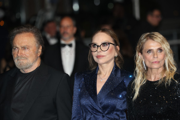 Franco Nero, Ornella Muti (in Solangel), Isabella Ferrari (in custom Saint Laurent), attend the "Roma Elastica" screening during the 79th annual Cannes Film Festival at Palais des Festivals on May 20, 2026 in Cannes, France.