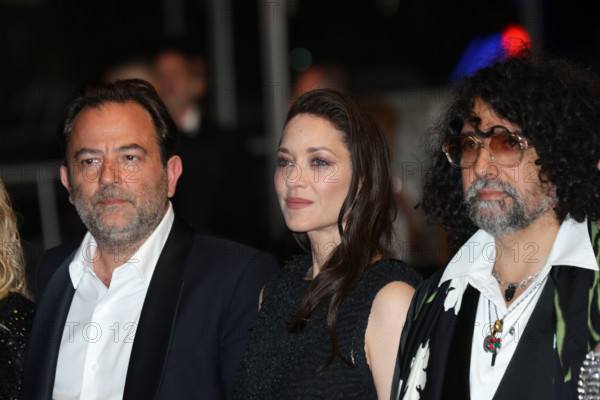 Thomas Verhaeghe, Marion Cotillard (in custom Chanel), Bertrand Mandico, attend the "Roma Elastica" screening during the 79th annual Cannes Film Festival at Palais des Festivals on May 20, 2026 in Cannes, France.