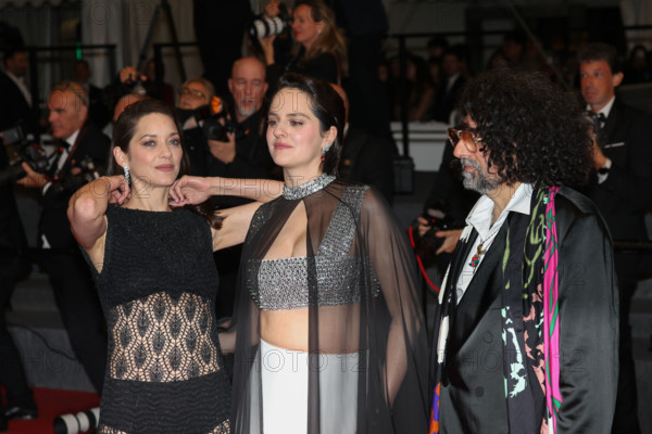 Marion Cotillard (in custom Chanel), Bertrand Mandico, Noémie Merlant (in custom Louis Vuitton)  attend the "Roma Elastica" screening during the 79th annual Cannes Film Festival at Palais des Festivals on May 20, 2026 in Cannes, France.