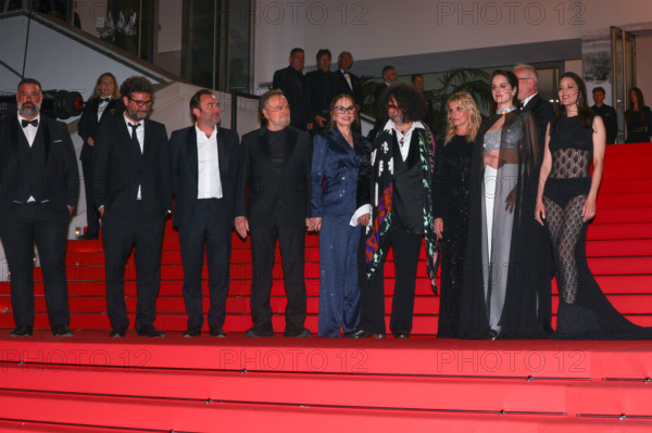 Mathieu Verhaeghe, Thomas Verhaeghe, Franco Nero, Ornella Muti (in Solangel), Bertrand Mandico, Noémie Merlant (in custom Louis Vuitton), Isabella Ferrari (in custom Saint Laurent) and Marion Cotillard (in custom Chanel) attend the "Roma Elastica" screening during the 79th annual Cannes Film Festival at Palais des Festivals on May 20, 2026 in Cannes, France