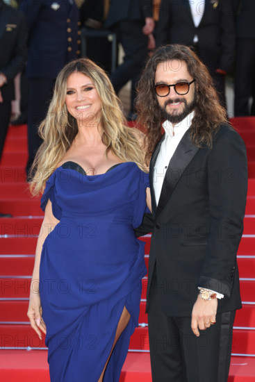 Heidi Klum (in Vivienne Westwood) and Tom Kaulitz attend the "La Bataille De Gaulle: L'Âge De Fer" (De Gaulle: Tilting Iron) screening during the 79th annual Cannes Film Festival at Palais des Festivals on May 20, 2026 in Cannes, France.