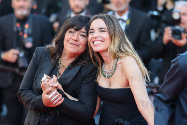 Romane Bohringer and Elodie Bouchez (in Saint Laurent) attend the "Histoires De La Nuit" (The Birthday Party) screening during the 79th annual Cannes Film Festival at Palais des Festivals on May 22, 2026 in Cannes, France.