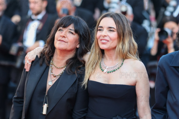 Romane Bohringer and Elodie Bouchez (in Saint Laurent) attend the "Histoires De La Nuit" (The Birthday Party) screening during the 79th annual Cannes Film Festival at Palais des Festivals on May 22, 2026 in Cannes, France.