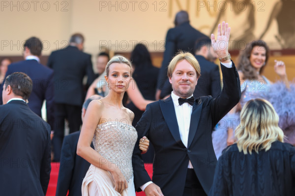 Simona Jakstaite (in Georges Hobeika) and Christopher Aleo attend the "Histoires De La Nuit" (The Birthday Party) screening during the 79th annual Cannes Film Festival at Palais des Festivals on May 22, 2026 in Cannes, France.
