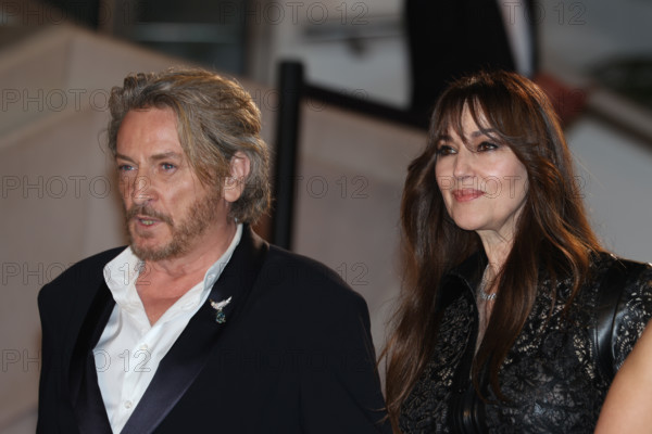 Benoit Magimel and Monica Bellucci (in Fendi) attends the "Histoires De La Nuit" (The Birthday Party) screening during the 79th annual Cannes Film Festival at Palais des Festivals on May 22, 2026 in Cannes, France.