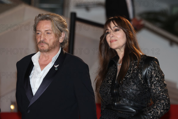 Benoit Magimel and Monica Bellucci (in Fendi) attends the "Histoires De La Nuit" (The Birthday Party) screening during the 79th annual Cannes Film Festival at Palais des Festivals on May 22, 2026 in Cannes, France.