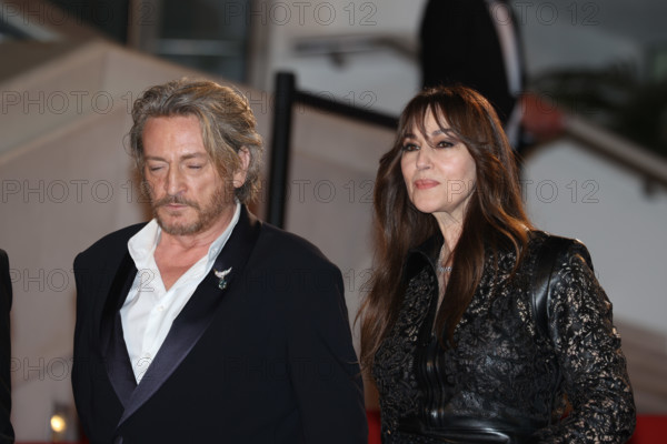 Benoit Magimel and Monica Bellucci (in Fendi) attends the "Histoires De La Nuit" (The Birthday Party) screening during the 79th annual Cannes Film Festival at Palais des Festivals on May 22, 2026 in Cannes, France.